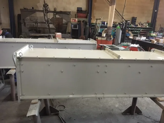 Trough section of a drag chain conveyor, pre-assembly
