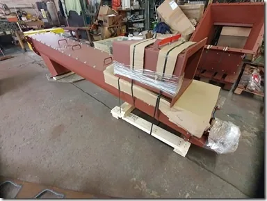 Trough screw conveyor for a waste incineration plant
